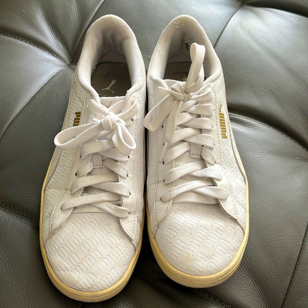 Puma white shoe.